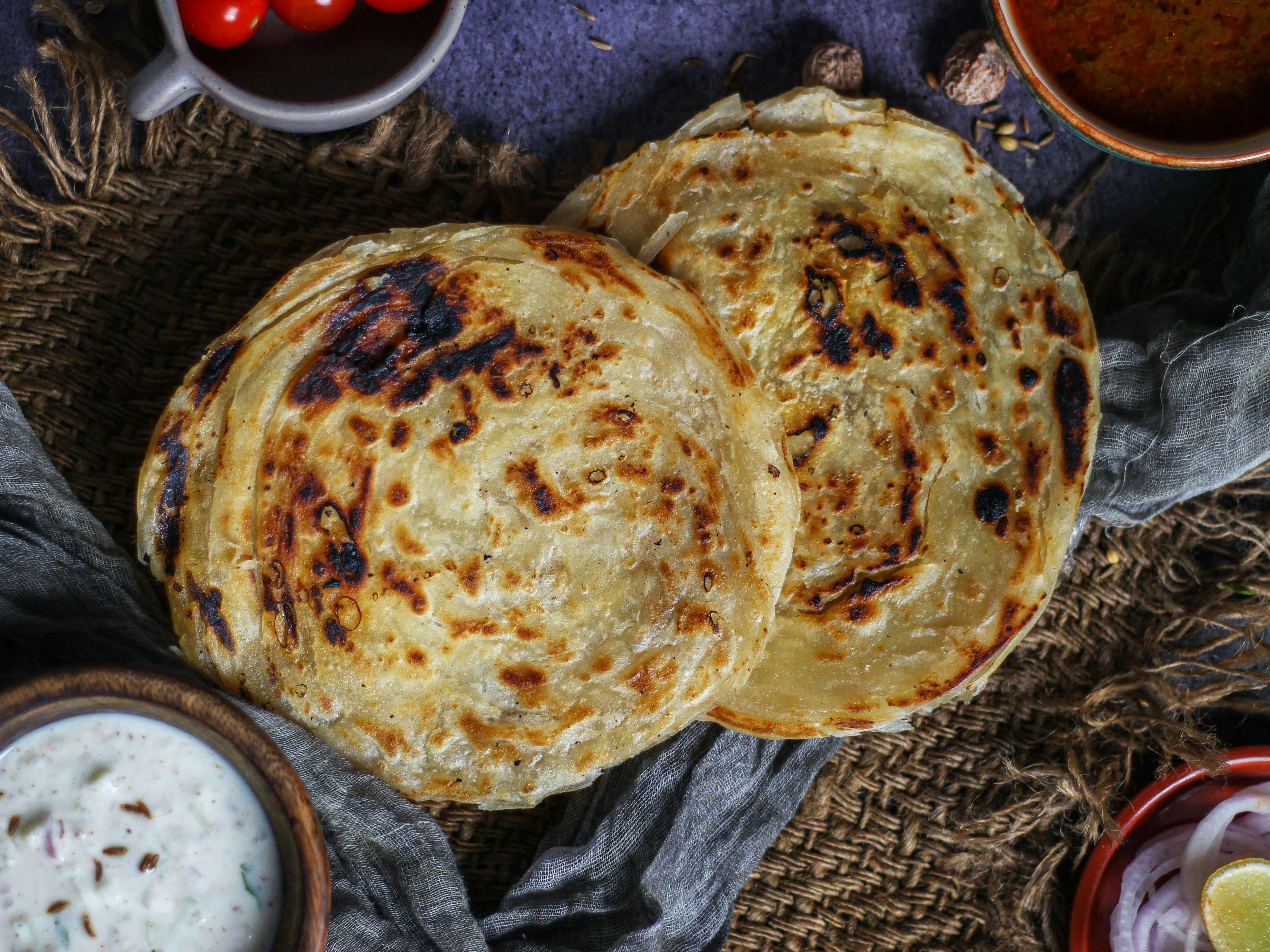 Butter garlic naan baked fresh at Bajwa's in Braga